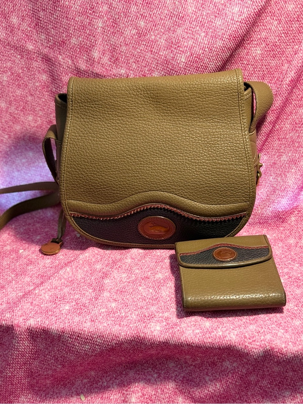 Dooney & Bourke Teton Saddle Bag &matching trifold wallet.
